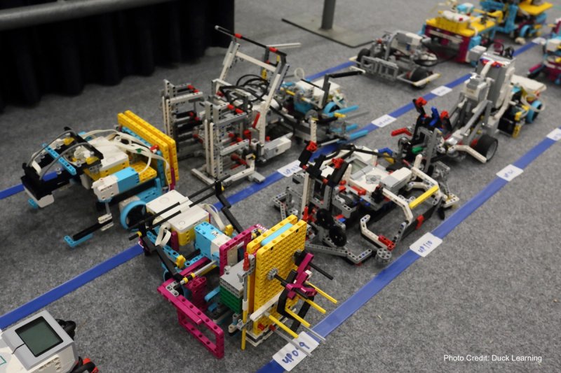 Pebbles students at robotics with LEGO and laptop